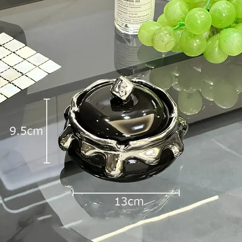 Black and silver decorbites lucky ceramic ashtray with glossy finish and ornate dripping design for premium smoking accessories
