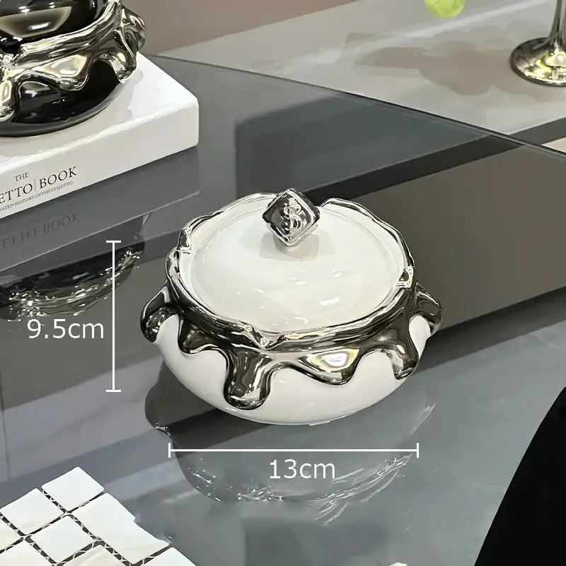 White ceramic ashtray with silver rim and lid featuring ornate dripping design and diamond handle decorbites lucky ceramic ashtray