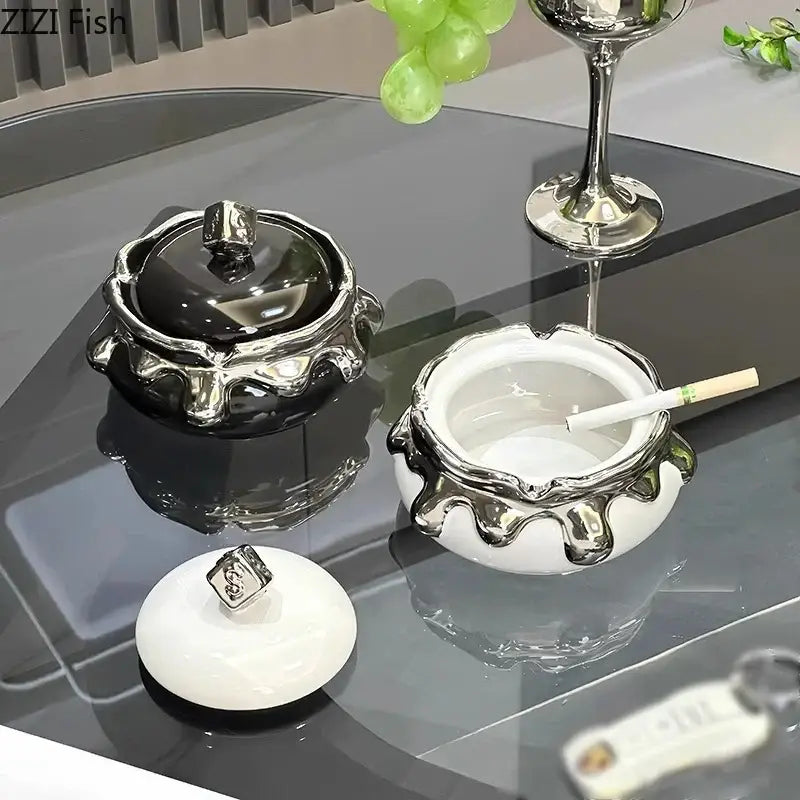 Black and white ceramic ashtrays with silver metallic drip detailing from decorbites lucky ceramic ashtray collection