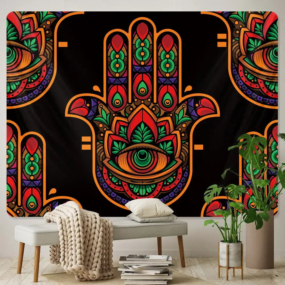 Vibrant decorbites lucky hand mandala tapestry wall hanging with intricate red green gold hamsa hand design on black background