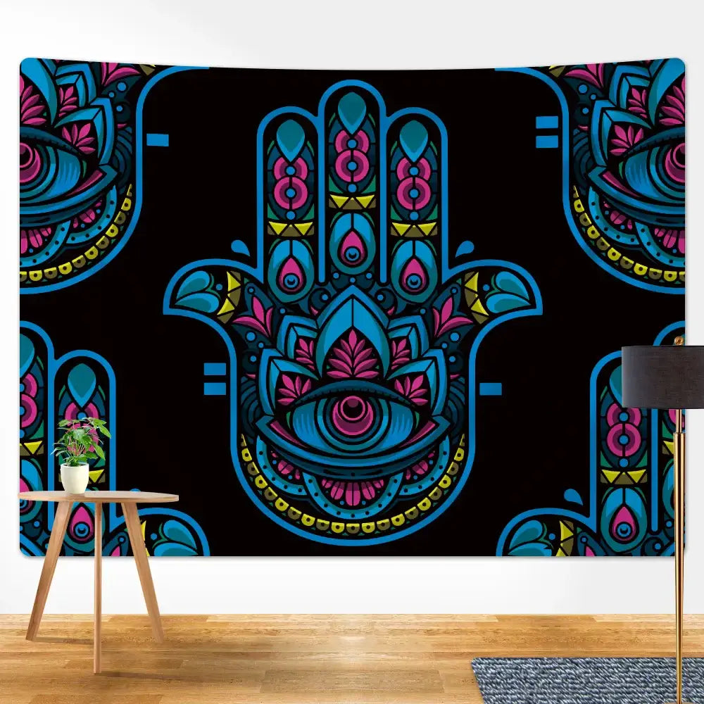 Vibrant blue and pink decorbites lucky hand mandala tapestry with intricate patterns for boho wall decor against black background