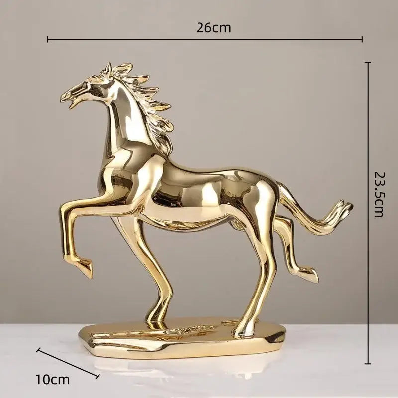 Golden metallic decorbites lucky horse resin figurine with sleek reflective surface and dynamic pose on matching base