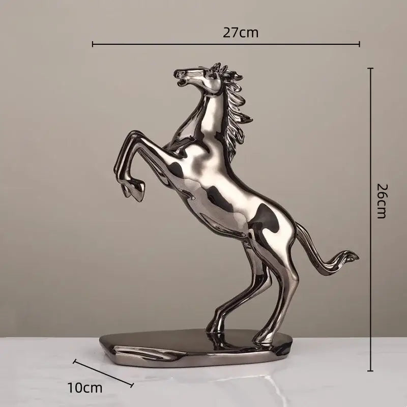 Shiny silver metallic decorbites lucky horse resin sculpture with sleek reflective surface and detailed mane and tail