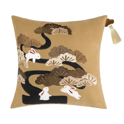Tan velvet DecorBites lucky rabbit pillowcase with embroidered white rabbits pine forests and matching tassel