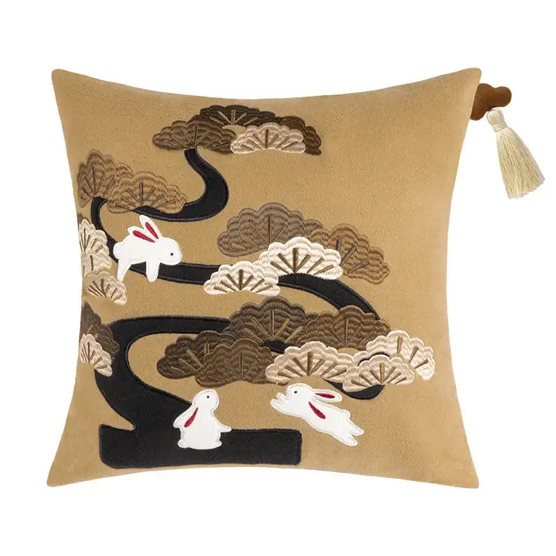 Tan velvet DecorBites lucky rabbit pillowcase with embroidered white rabbits pine forests and matching tassel