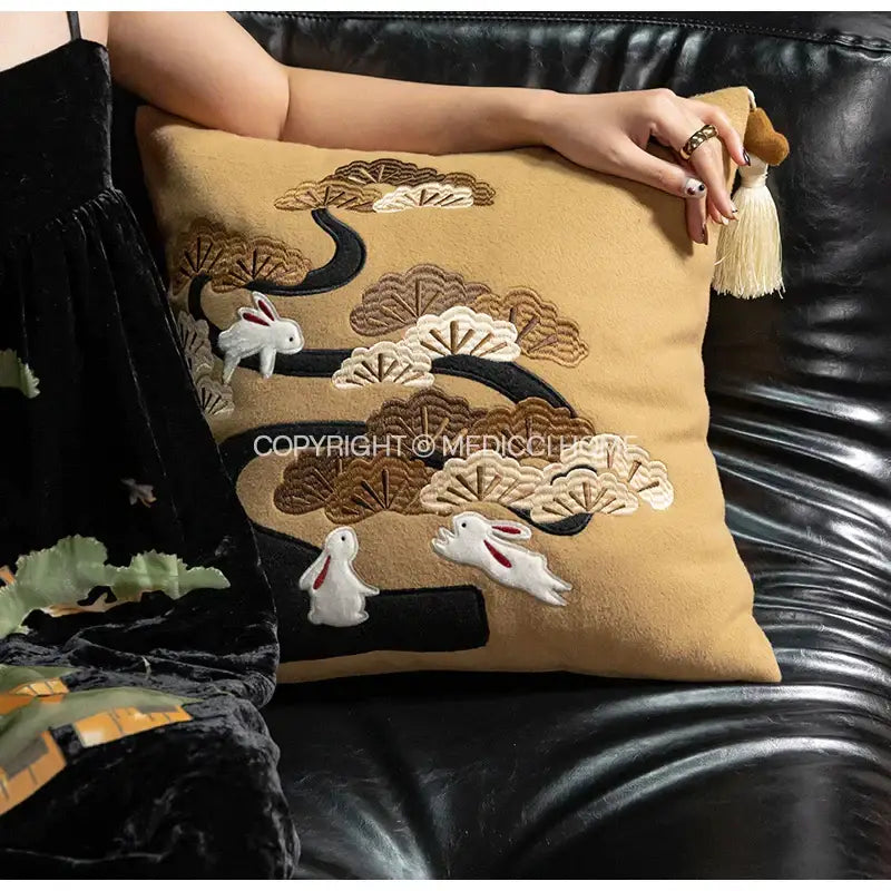 Tan silk velvet pillowcase with tassels featuring decorbites lucky rabbit pine embroidery of rabbits and pine forests
