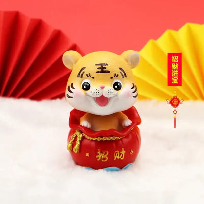 Decorbites™ lucky tiger figurine yellow with black stripes on red chinese money bag base featuring gold lettering