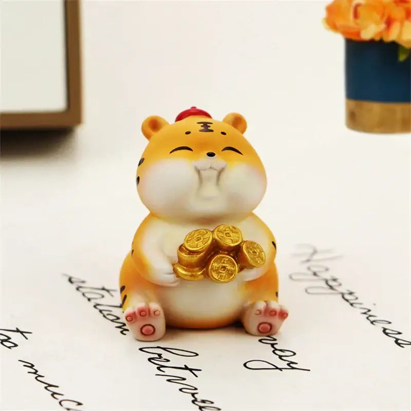 Cute orange and white lucky tiger figurine with black stripes holding golden coins for new year fortune decor