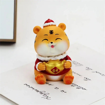 Cute orange lucky tiger figurine wearing red santa hat and festive robe holding golden money pot for new year decor