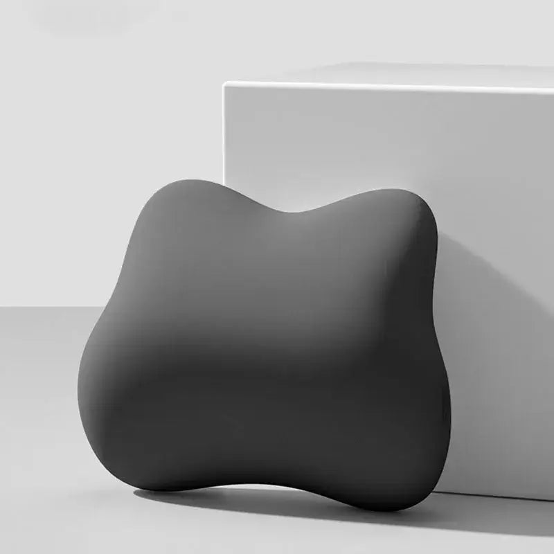 A sleek dark gray ergonomically contoured memory foam neck pillow from DecorBites lumbar support memory series
