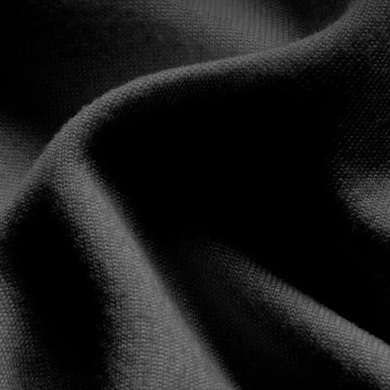 Black textured knit fabric with a soft ribbed weave on decorbites lumbar support memory foam cushion for office chair and car seat