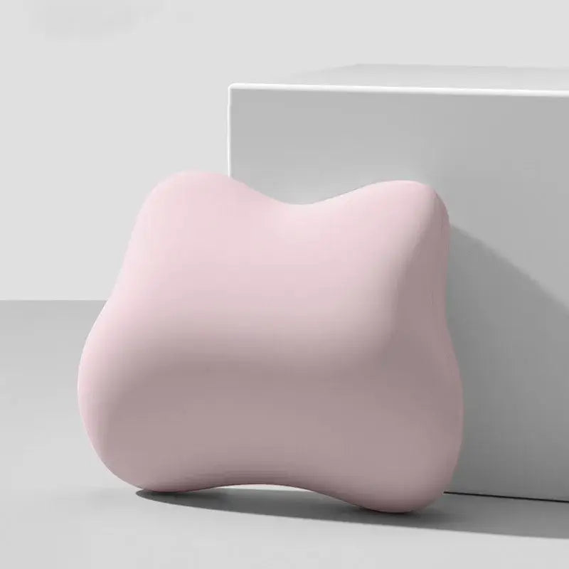 Decorbites lumbar support memory foam cushion in soft pastel pink with contoured surface for office chair and car seat
