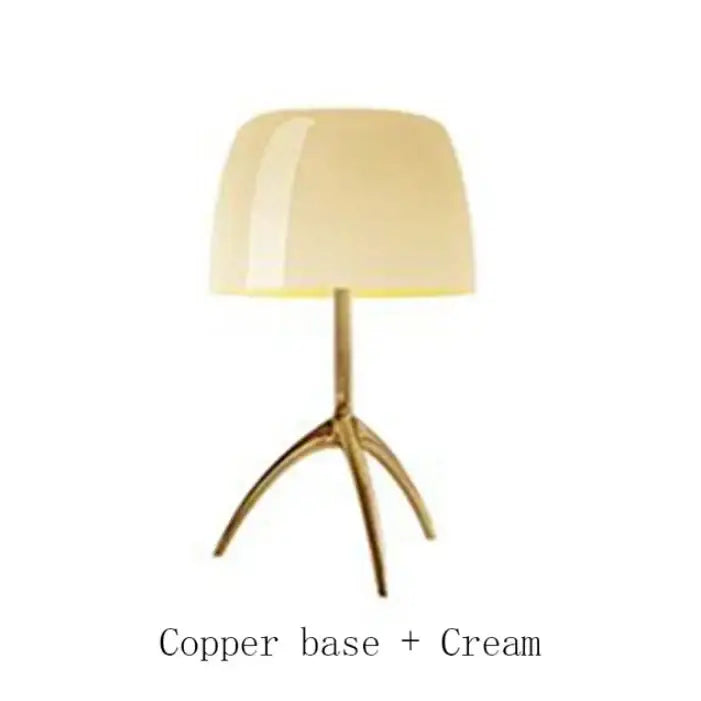 Cream-colored glossy lampshade on copper tripod base in decorbites lumiere table modern led bedside lamp