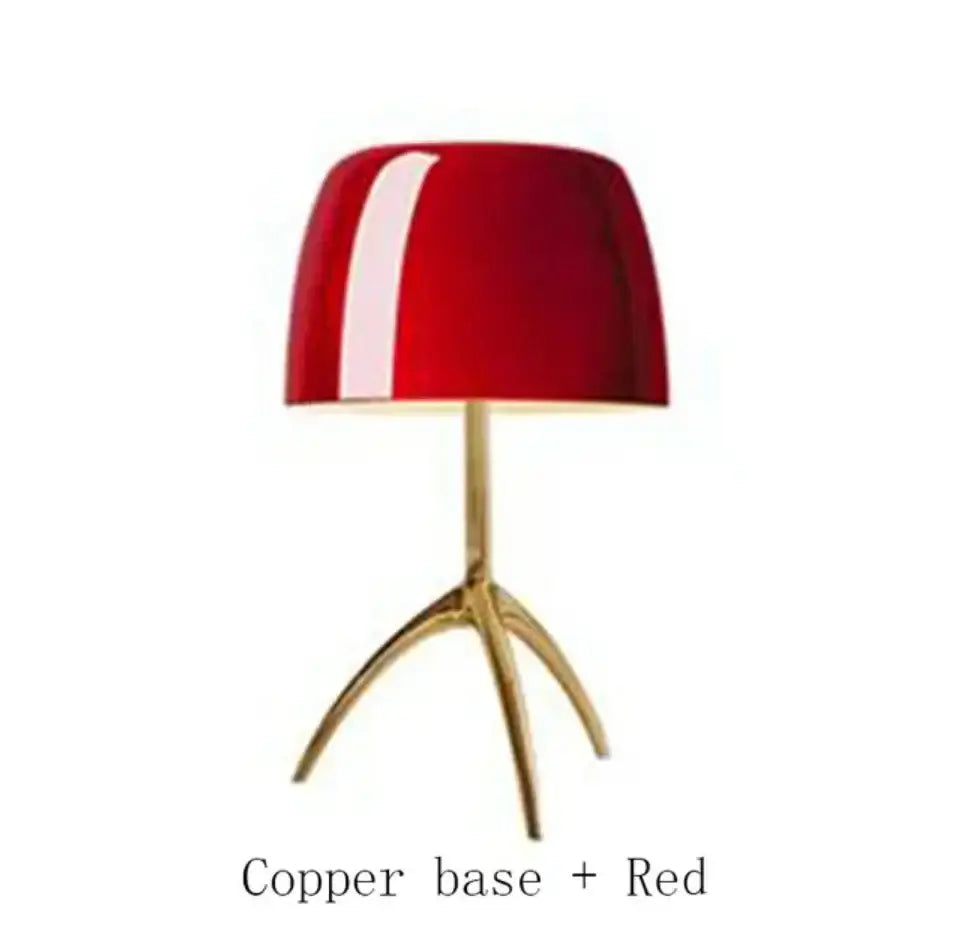 Red lampshade with white stripe on copper tripod base in the decorbites lumiere table lamp for bedroom use