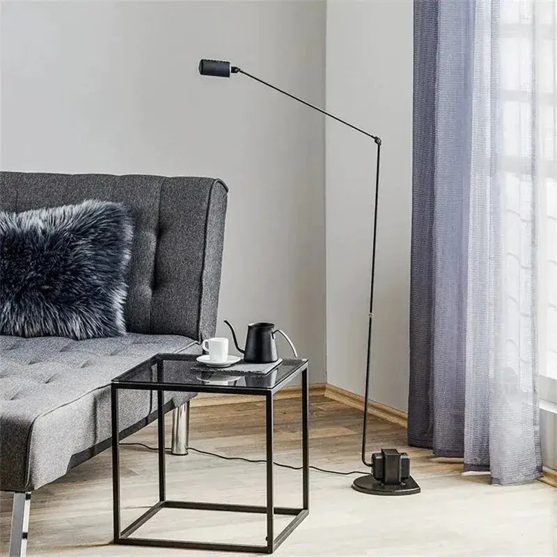 Black metal floor lamp decorbites lumina with sleek minimalist design and adjustable long arm for reading and study room