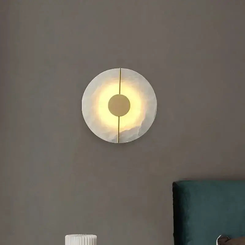 Modern circular wall lamp with frosted glass diffuser and gold accent by decorbites lumind copper for bedroom use