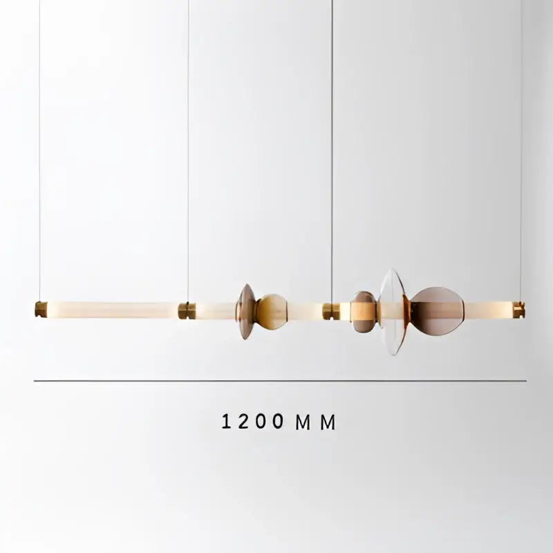 DecorBites luna glass tube chandelier with amber glass discs and polished brass accents for kitchen or dining lighting