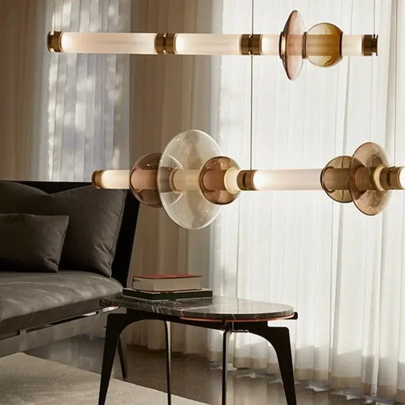 Modern two-tiered luna glass tube chandelier with frosted glass tubes and amber accents for kitchen dining staircase lighting