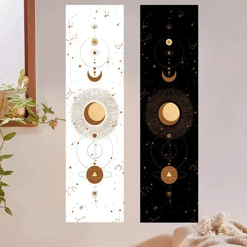 Two vertical DecorBites lunar eclipse moon phase tapestries in white and black with gold celestial and geometric designs