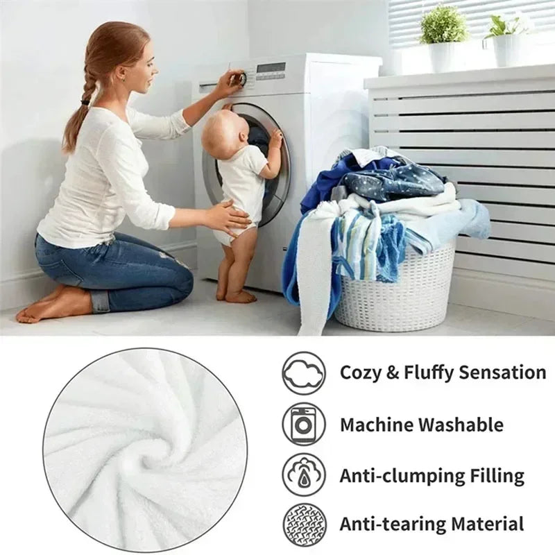 Fluffy white machine washable blanket with anti-clumping filling and anti-tearing material.