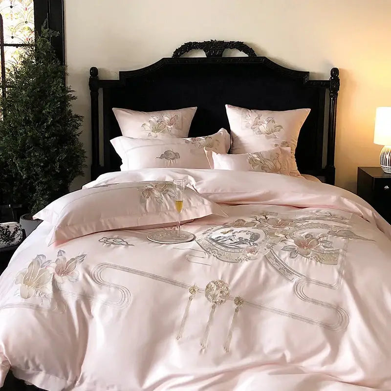Pink satin duvet cover with gold and silver floral embroidery from decorbites luxe floral bird bedding set