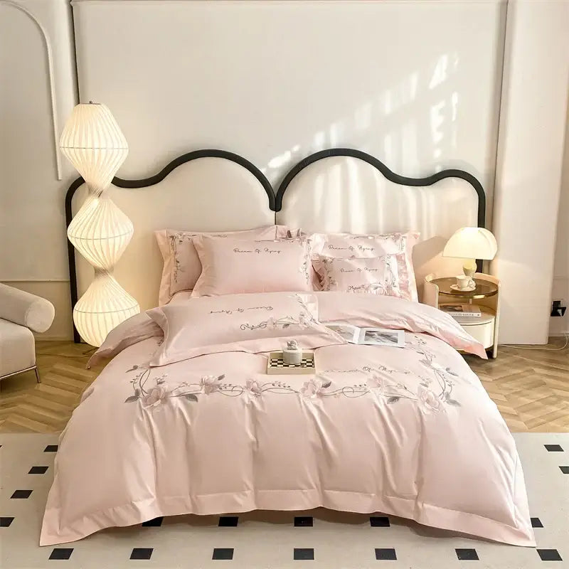 Pink floral embroidered bedding set with delicate silver thread detailing from decorbites luxe floral embroidery collection in 100% cotton