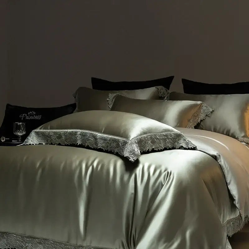 Silk satin bedding set in soft sage green with delicate lace trim from decorbites luxe french lace collection