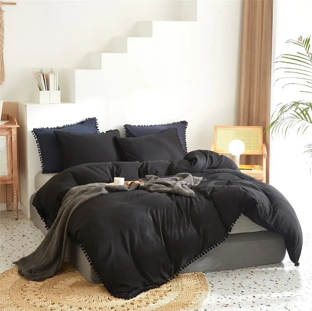 Black velvet duvet bedding set with yellow pom-pom trim from decorbites luxe furball tasseled collection queen king size