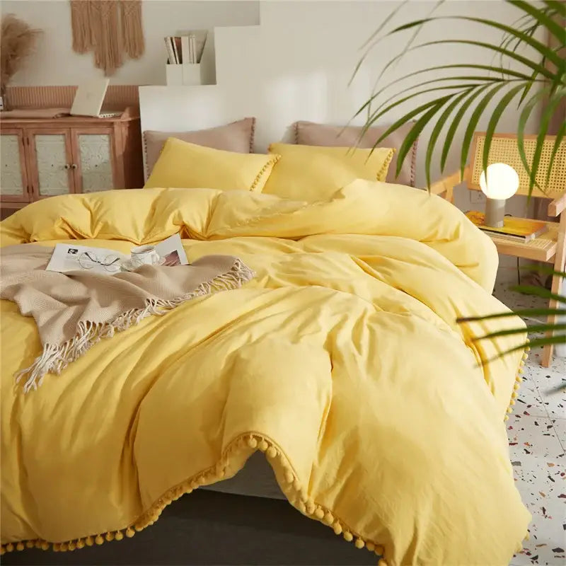 Yellow pom-pom bed set featuring decorbites luxe furball tasseled queen king size duvet cover and soft bedding set