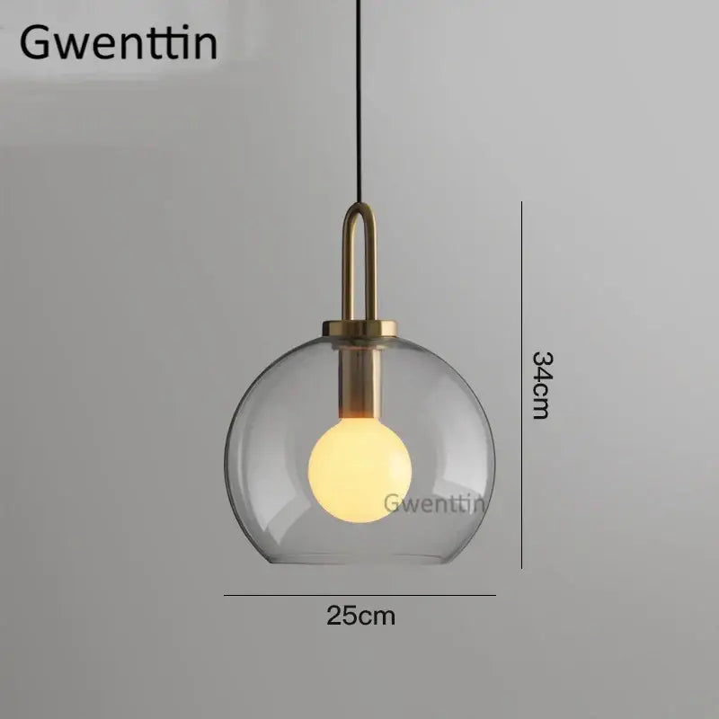 Decorbites luxe glass ball pendant light with frosted gray glass and brass hardware for modern home decor