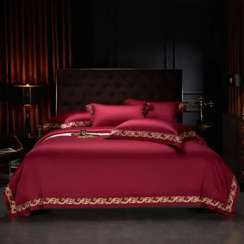 Deep red satin bedding set with intricate luxe gold embroidery by decorbites luxe gold in 1400tc egyptian cotton