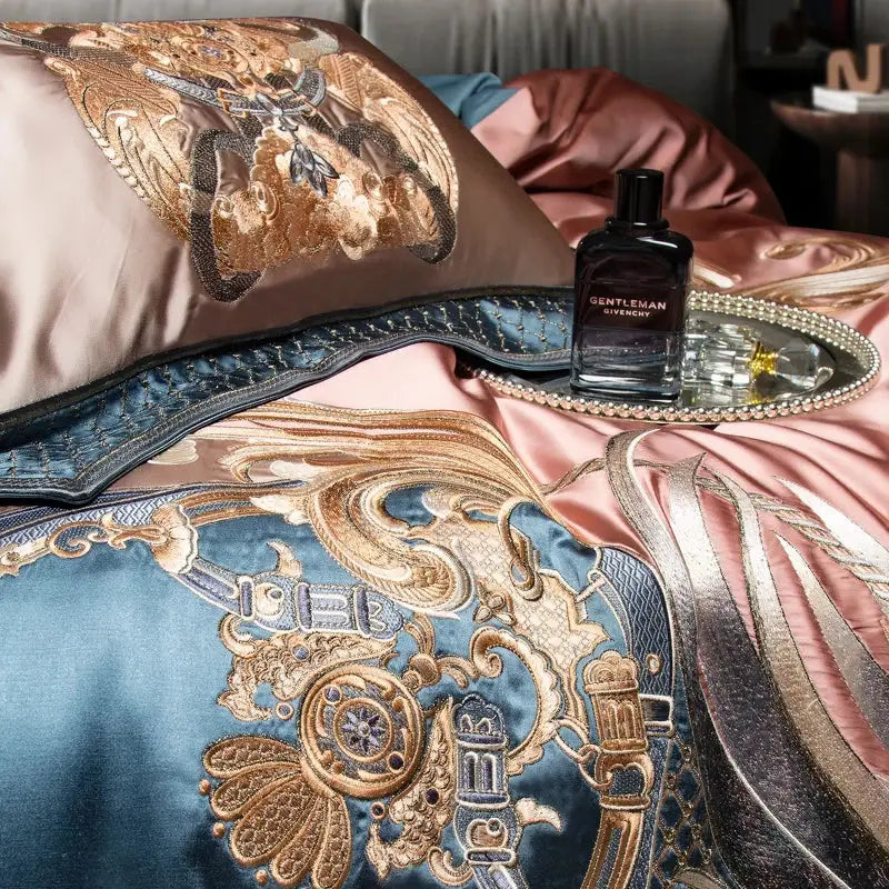 Luxurious satin bedding set with intricate blue and gold luxe gold embroidery by DecorBites for elegant decor