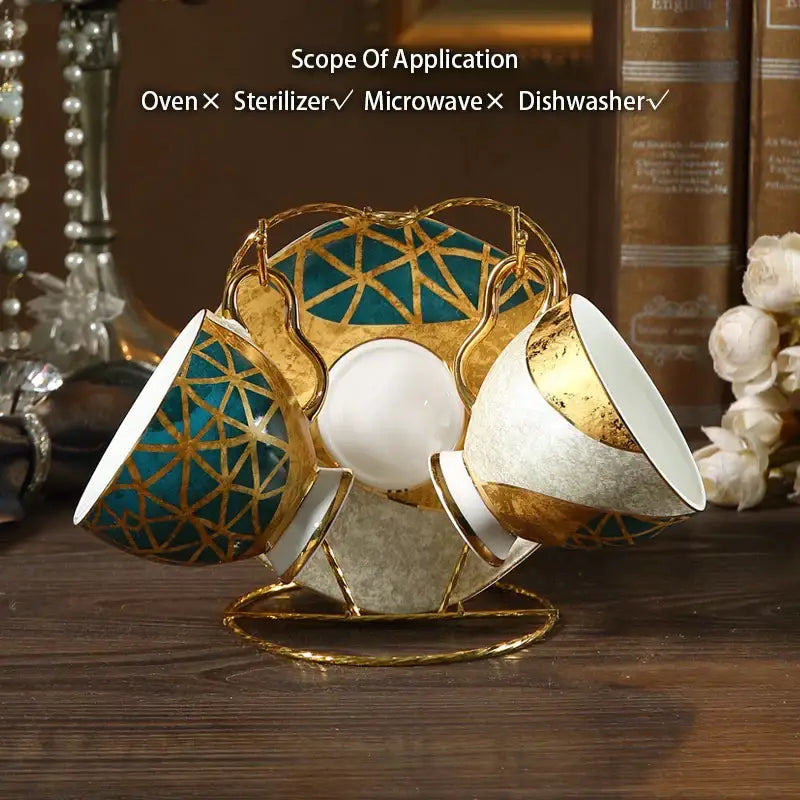 Elegant teal and gold inlay porcelain teacup set with matching saucers on a golden stand from decorbites luxe gold coffee set