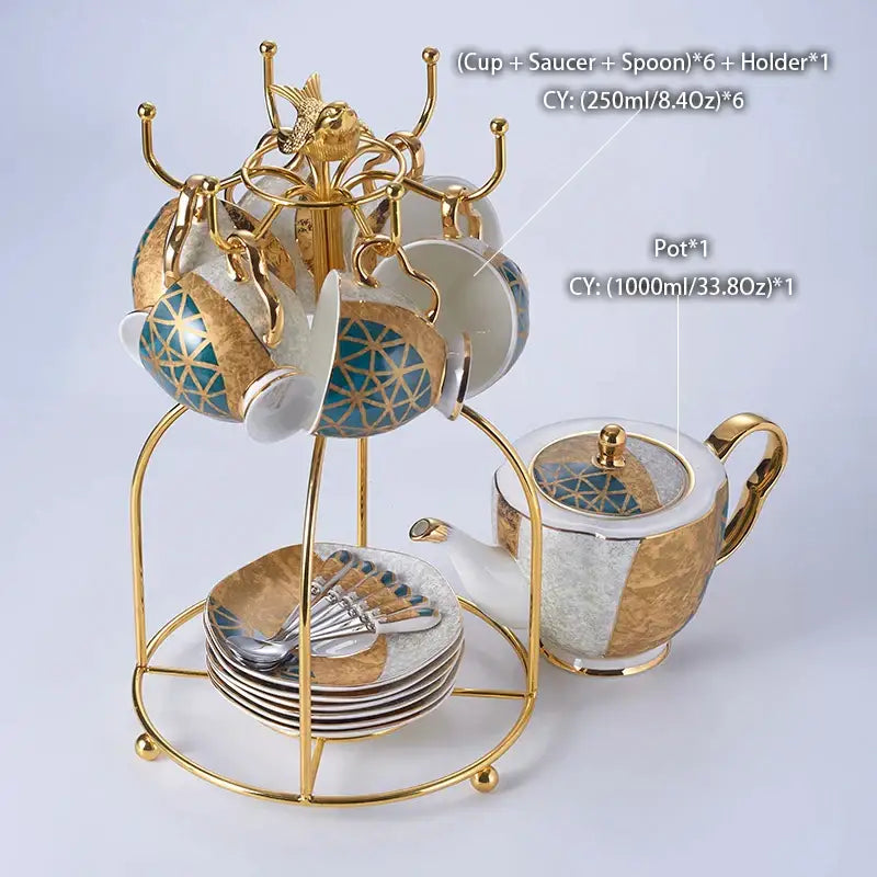 Gold inlay decorbites luxe gold coffee set with ornate blue and gold ceramic cups, teapot, and stacked saucers on metal stand