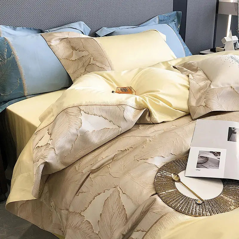 Cream-colored satin jacquard embroidery bedding set with gold leaf design and soft blue 1000tc Egyptian cotton pillowcases