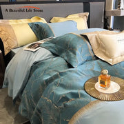 Teal satin jacquard embroidery bedding set with gold leaf design and matching cream yellow light blue pillows in 1000tc egyptian cotton