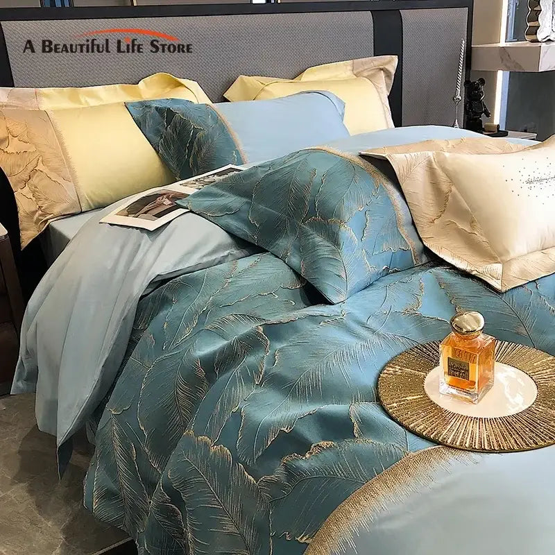 Teal satin jacquard embroidery bedding set with gold leaf design and matching cream yellow light blue pillows in 1000tc egyptian cotton