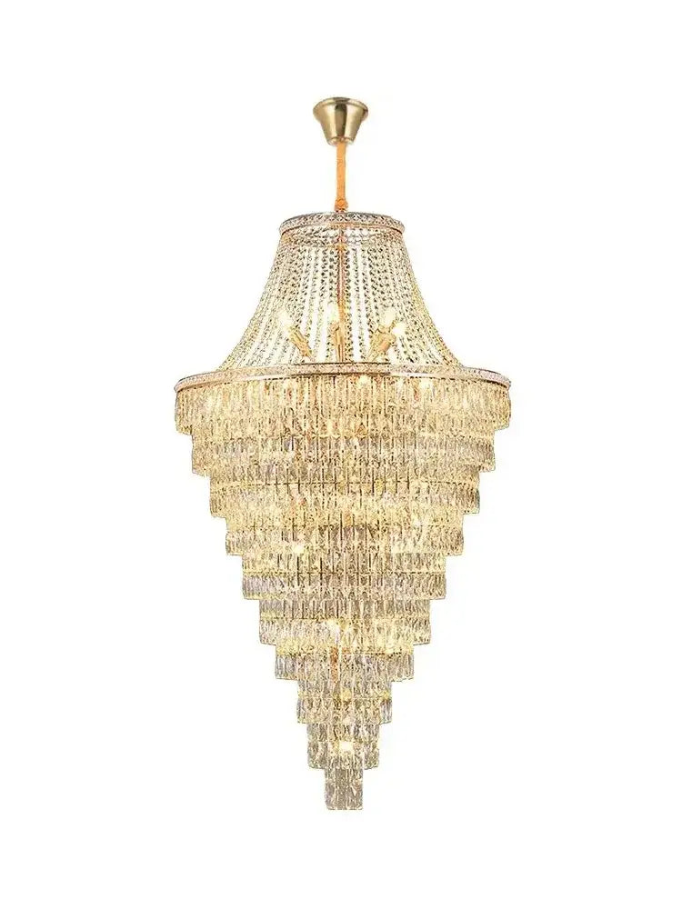 A multi-tiered decorbites luxe golden crystal chandelier with gold metal frame and cascading faceted crystals for elegant spaces