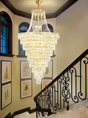 Decorbites luxe golden multi-tiered crystal chandelier with gold finish and cascading clear faceted crystals for living rooms
