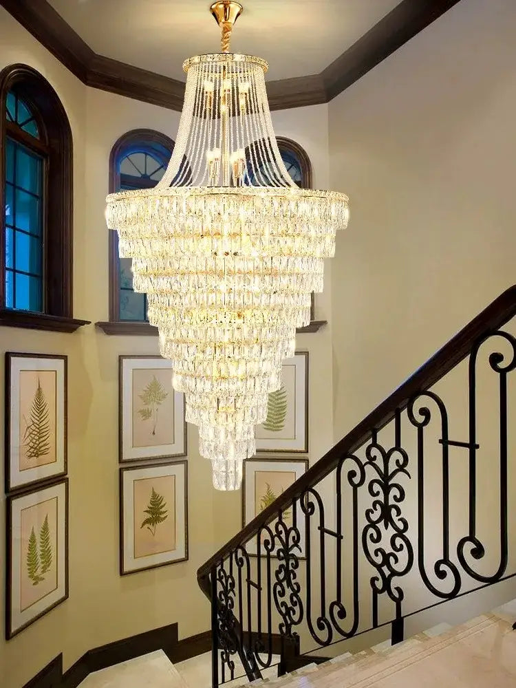 Decorbites luxe golden multi-tiered crystal chandelier with gold finish and cascading clear faceted crystals for living rooms