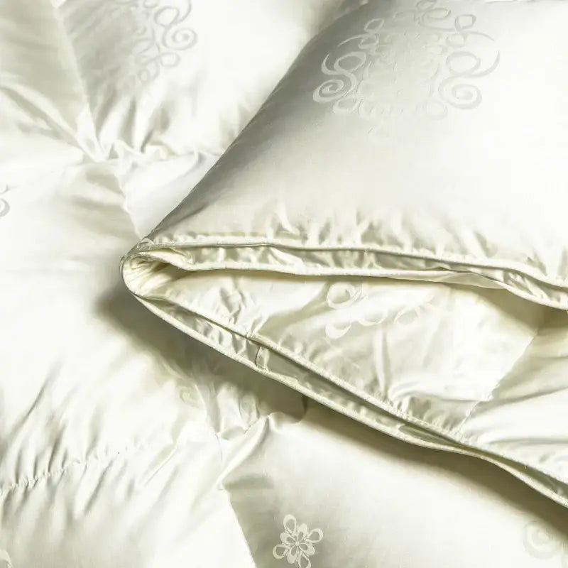 Cream-colored decorbites luxe goose quilt with silver floral embroidery, fluffy warm down comforter for queen king size beds