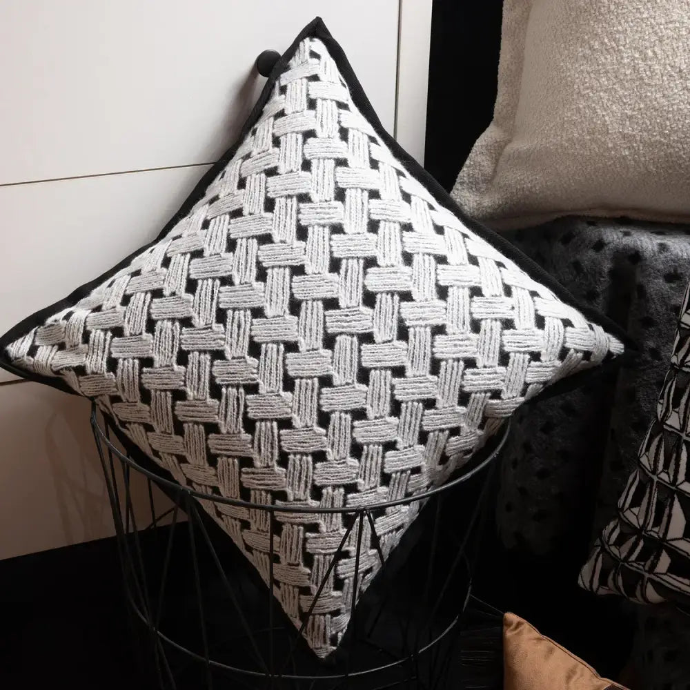 Square-shaped decorbites luxe hotel cushion cover in black and white woven texture with braided threads for sofas and living rooms