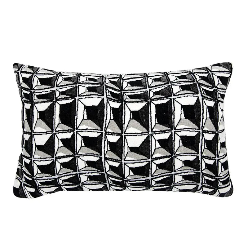 Black and white geometric patterned decorbites luxe hotel rectangular pillow with textured embroidered design for sofas