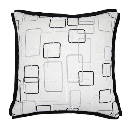 White square decorbites luxe hotel pillowcase with black and gray embroidered geometric patterns and solid black border