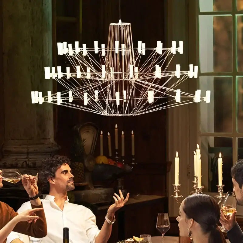 A modern decorbites luxe iron wire round chandelier with metallic frame and white rectangular lights for living rooms