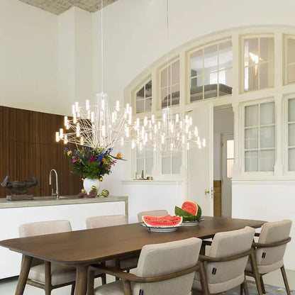 A modern white decorbites luxe iron wire round chandelier with delicate branching design for dining room lighting