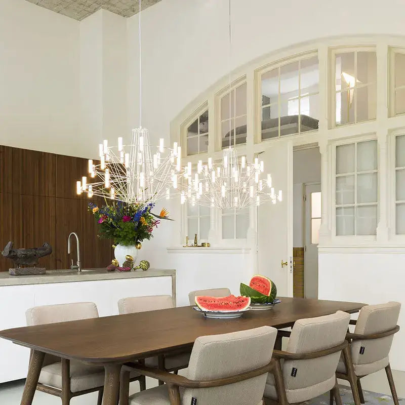 A modern white decorbites luxe iron wire round chandelier with delicate branching design for dining room lighting