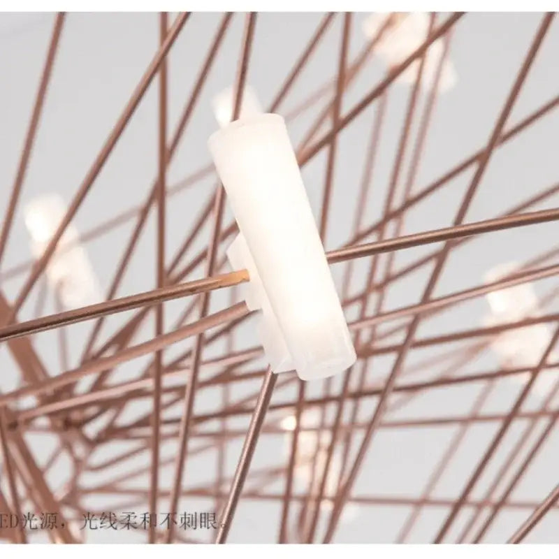 A sleek translucent white cylindrical led light fixture with a modern design from decorbites luxe iron wire round chandelier