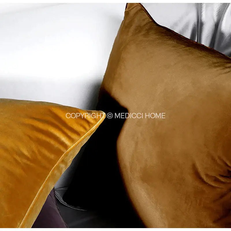 Rich caramel-colored decorbites luxe italy velvet pillowslip with soft plush texture and neatly finished edges for sofa use