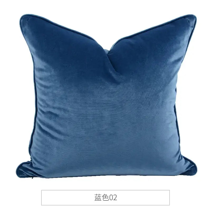 A plush deep blue velvet square pillow with soft texture and stitched edges from decorbites luxe italy velvet collection